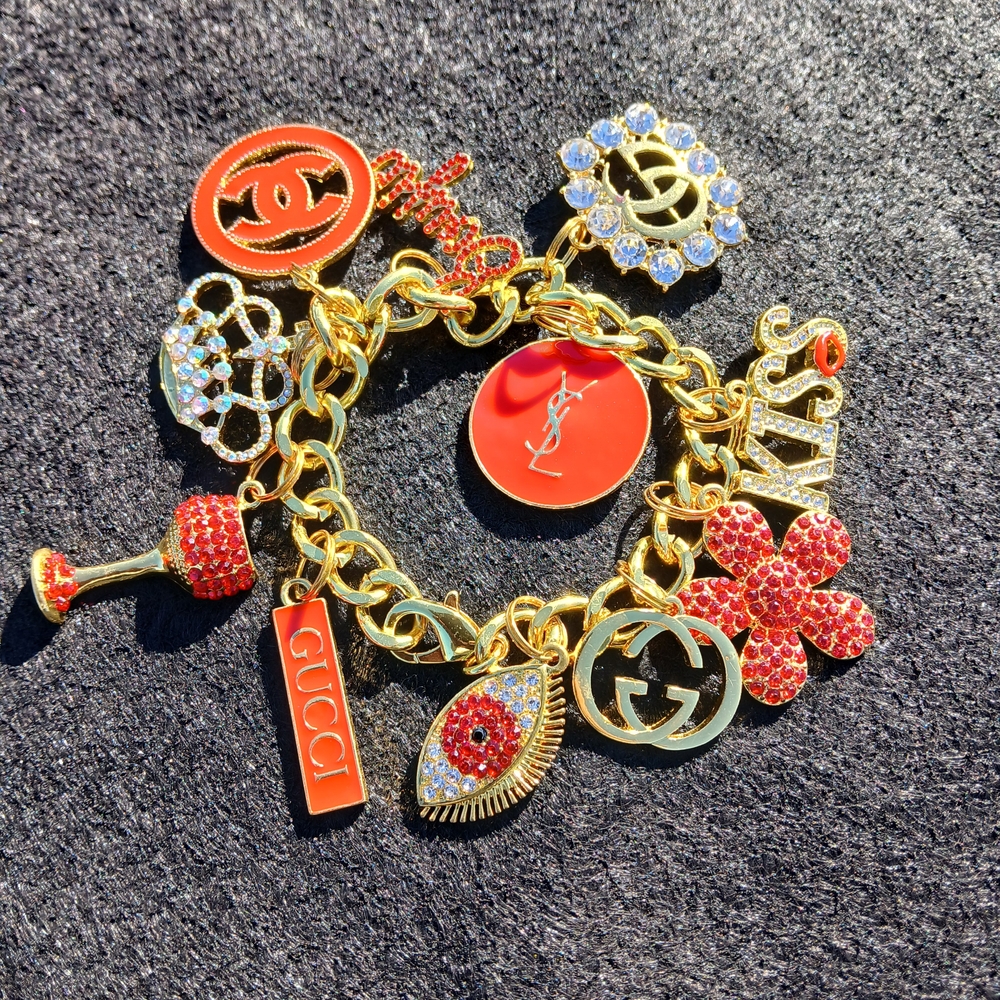Gold and Red Fashion 11 Charms Bracelet